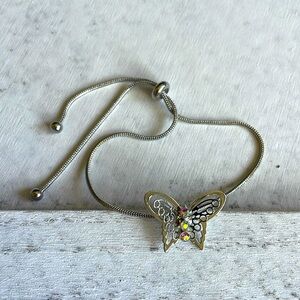 Dainty butterfly adjustable silver toned metal bracelet